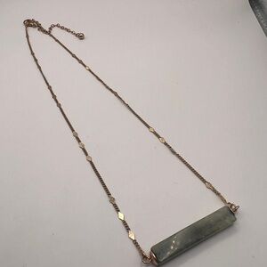 Jadeite bar on a gold tone chain necklace